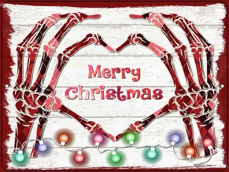 Novelty Christmas tin sign with skeletal hands forming a heart, colorful lights, and festive text.