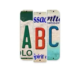 Three decorative license plate art pieces with colorful letters on a white background