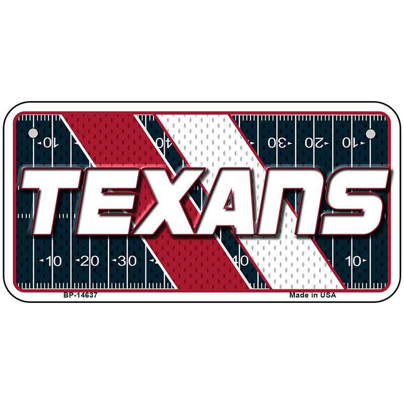 License plate with 'TEXANS' text on a football field design