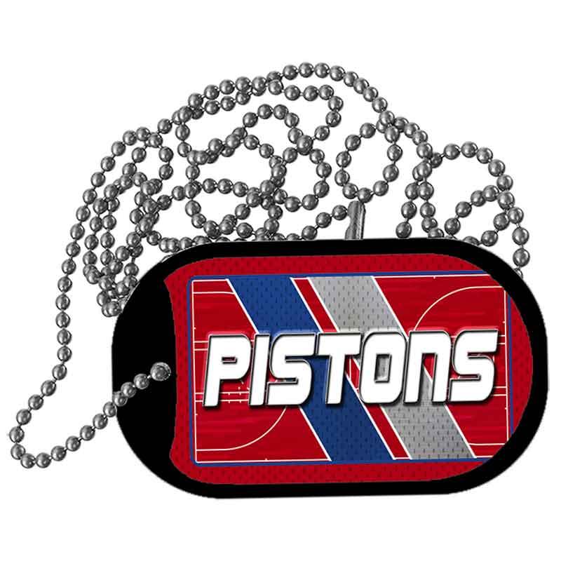 Dog tag with 'Pistons' text and sports ball design on a white background
