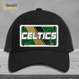 Black cap with Celtics logo on a gray background
