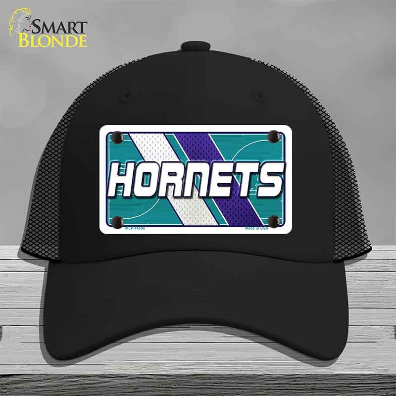 Black cap with Hornets logo on a gray background