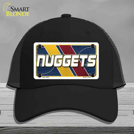 Black cap with 'NUGGETS' design on a gray background