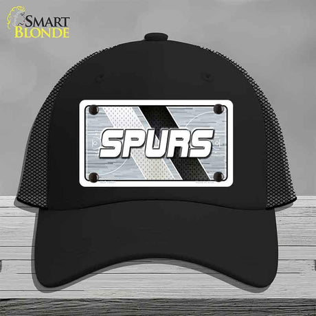 Black cap with 'SPURS' logo on a gray background