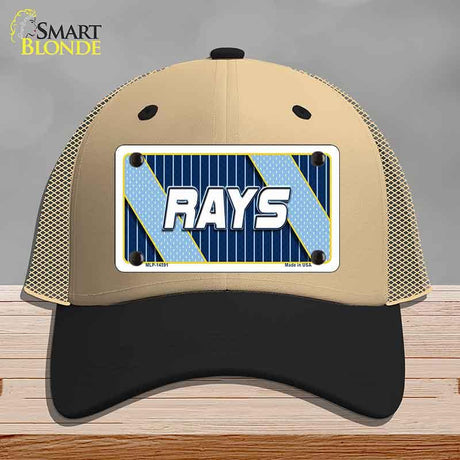 Beige and black cap with a 'RAYS' license plate design on a wooden surface.