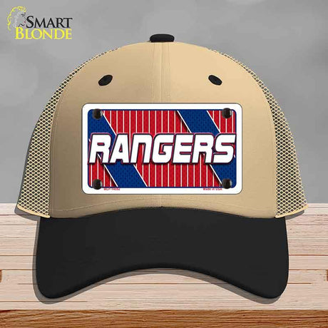 Beige and black cap with a 'Rangers' logo on a wooden surface