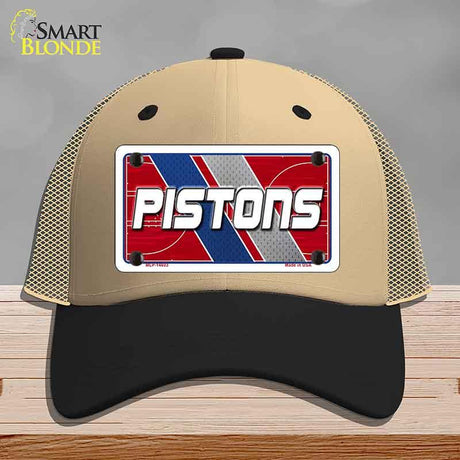 Beige and black cap with 'PISTONS' logo on a gray background