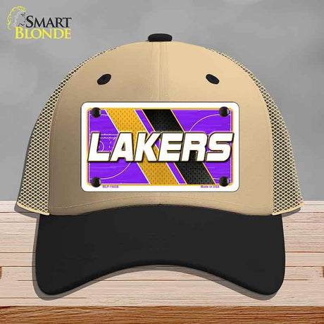 Beige and black cap with Lakers logo on a gray background