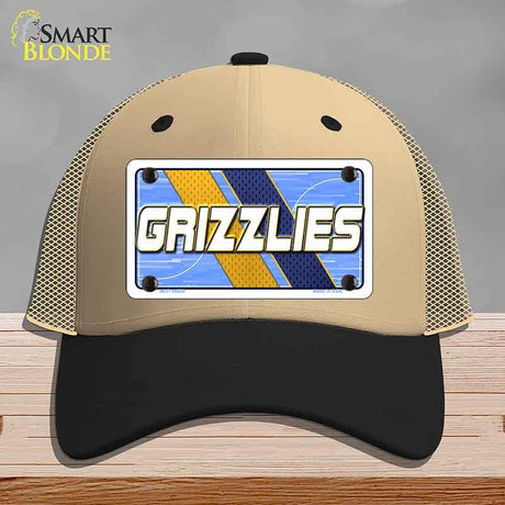 Beige and black cap with 'GRIZZLIES' logo on a gray background