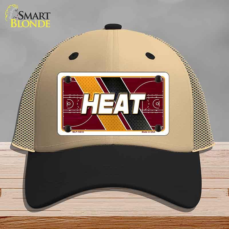 Beige and black cap with 'HEAT' logo on a gray background