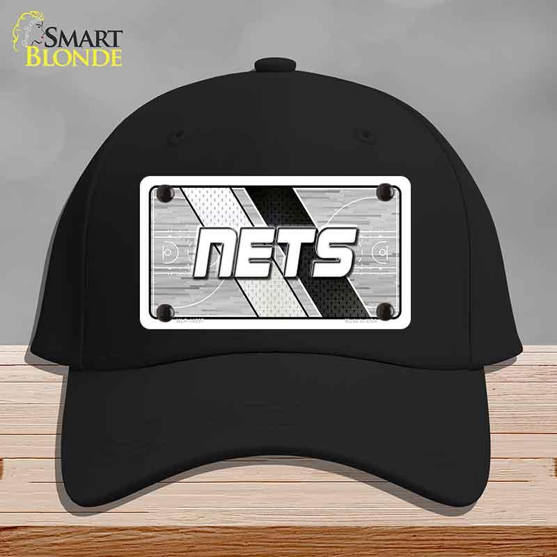 Black cap with 'NETS' logo on a gray background