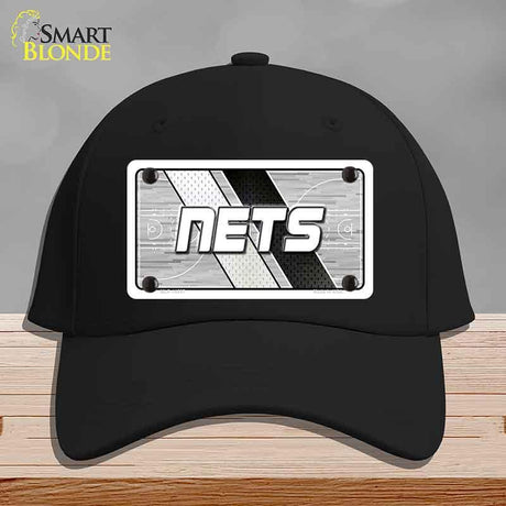 Black cap with 'NETS' logo on a gray background