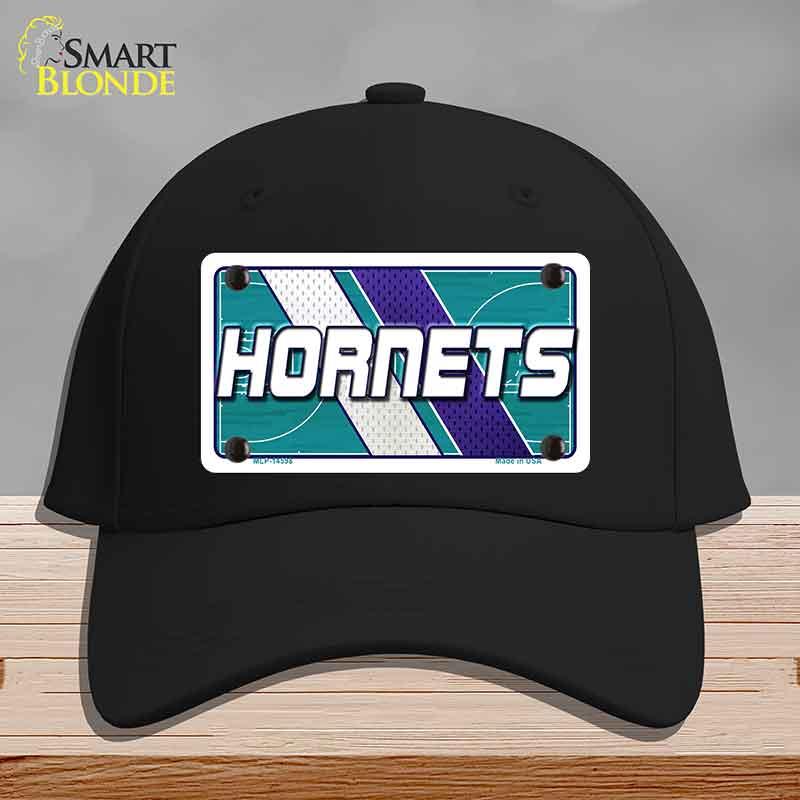 Black cap with Hornets logo on a gray background