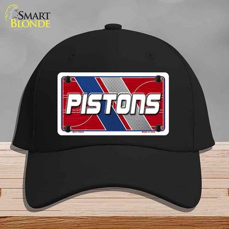 Black cap with 'PISTONS' logo on a gray background