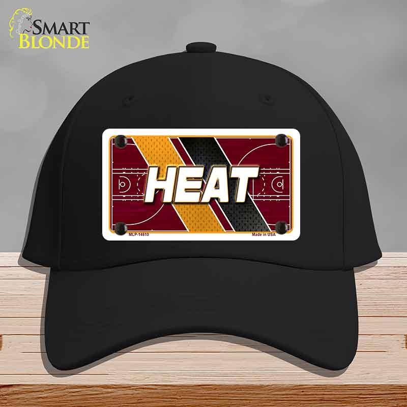 Black cap with 'HEAT' design on a gray background