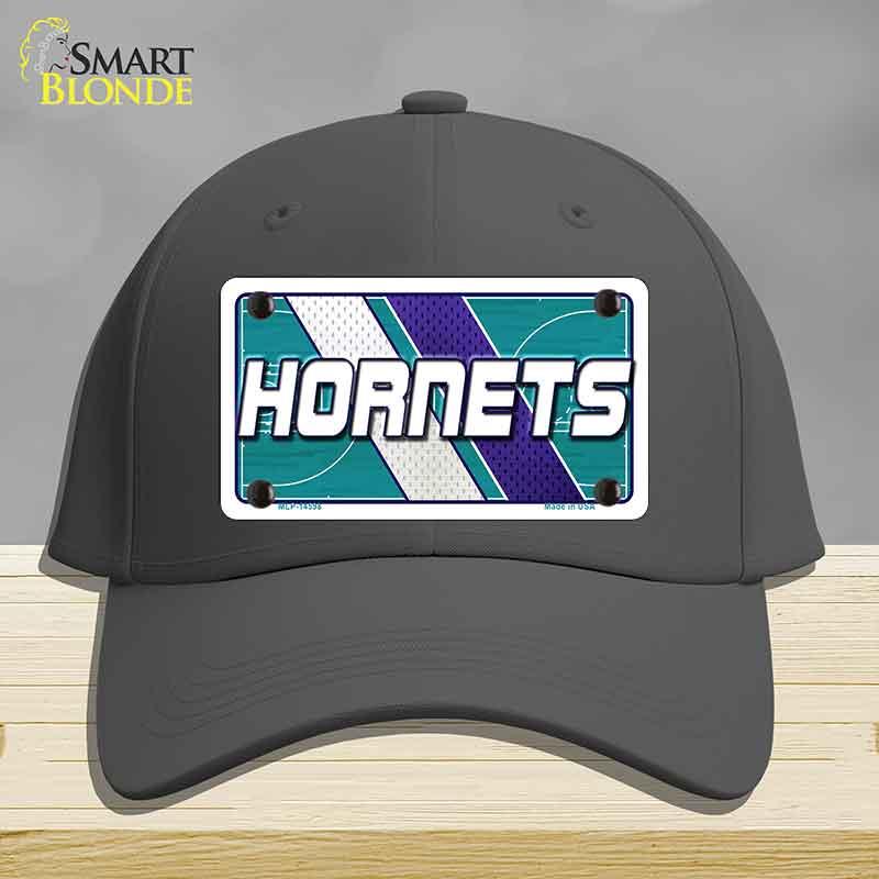 Black cap with Hornets logo on a gray background