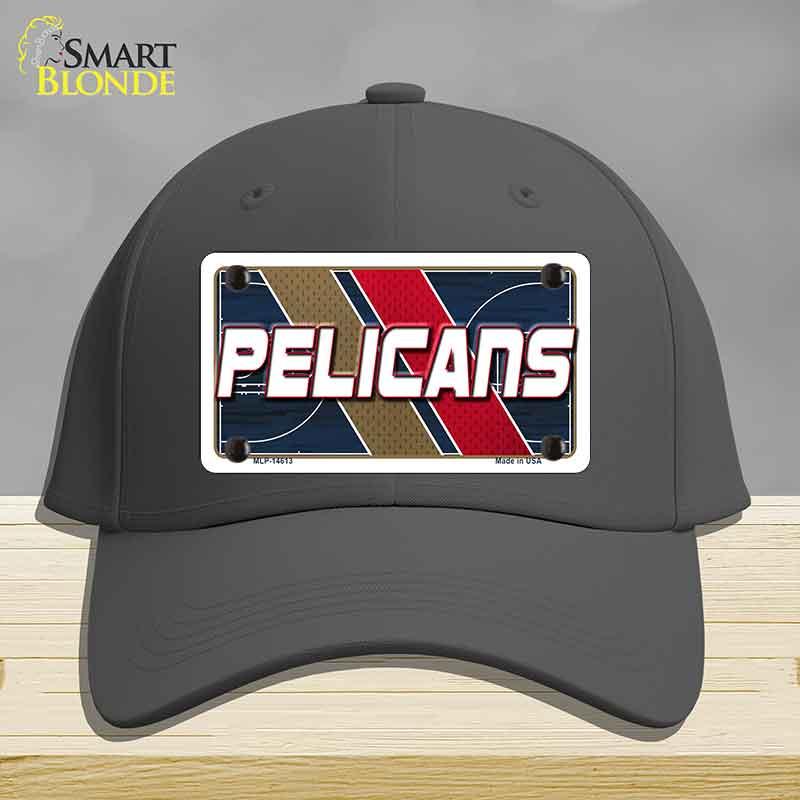 Dark gray cap with 'Pelicans' logo on a wooden surface and gray background