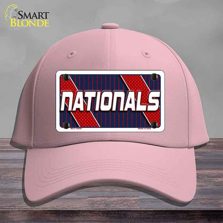 Pink cap with 'NATIONALS' license plate design on a gray background