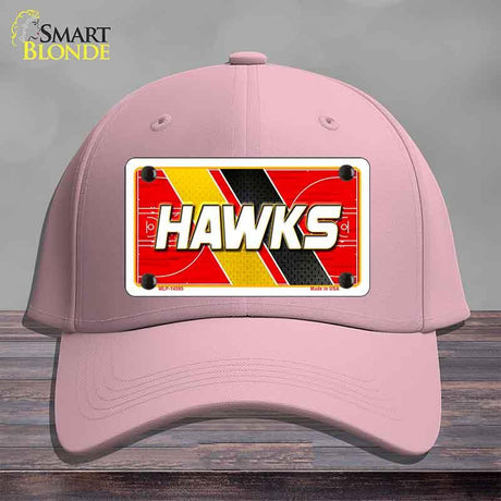 Pink cap with a 'HAWKS' license plate design on a gray background