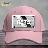 Pink cap with 'NETS' logo on a gray background