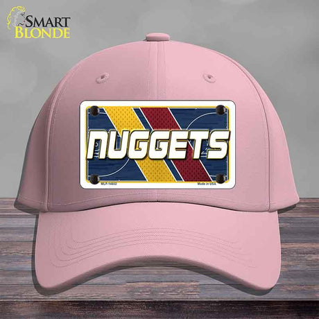 Pink cap with a 'NUGGETS' license plate design on a gray background