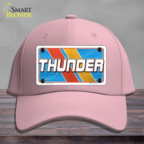 Pink cap with a 'THUNDER' license plate design on a gray background