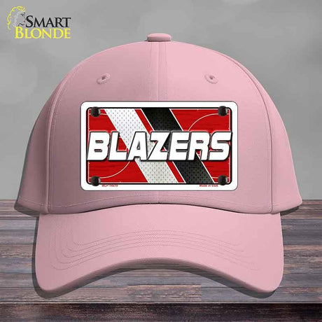 Pink cap with 'BLAZERS' logo on a gray background