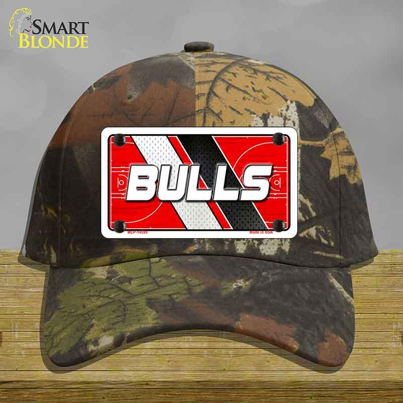 Camouflage cap with a 'BULLS' license plate design on a wooden surface.
