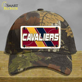 Camouflage cap with Cavaliers license plate design on a wooden surface
