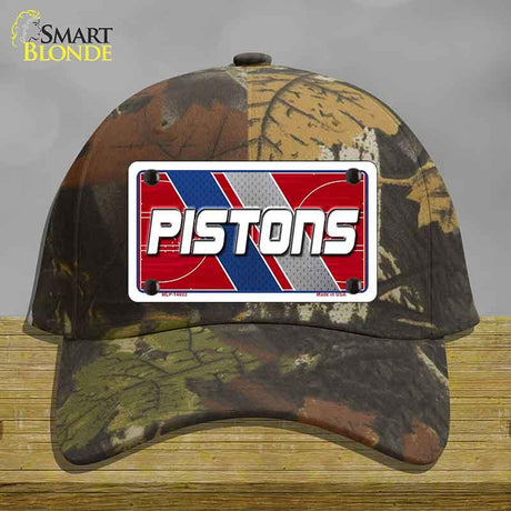 Camouflage cap with Pistons logo on a wooden surface