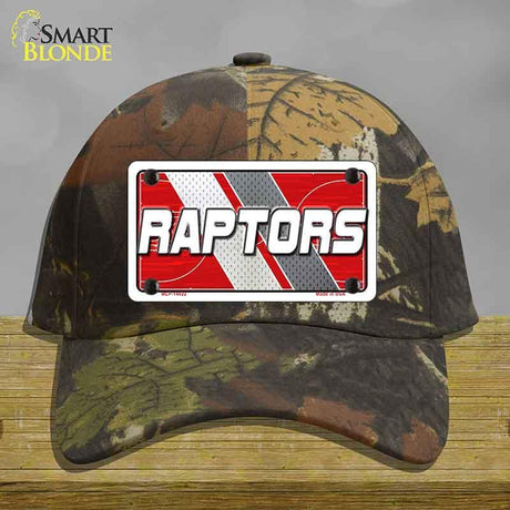 Camouflage cap with a Raptors license plate design on a wooden surface