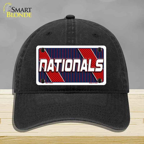 Black cap with 'NATIONALS' license plate design on a gray background