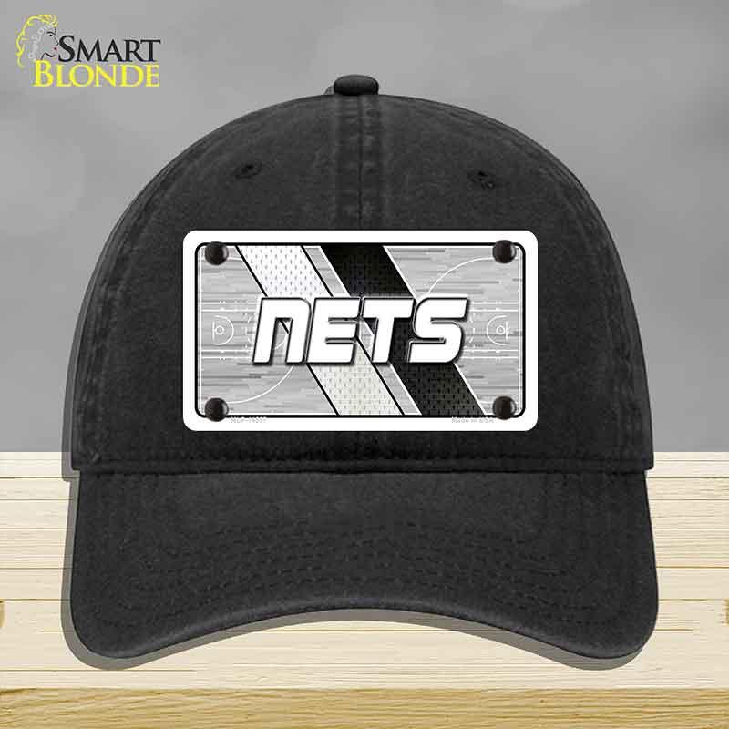 Black cap with 'NETS' logo on a gray background