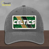 Gray cap with Celtics logo on a wooden surface