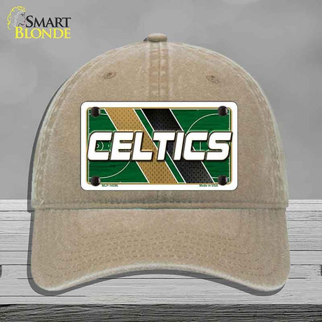 Beige cap with Celtics logo on a gray background