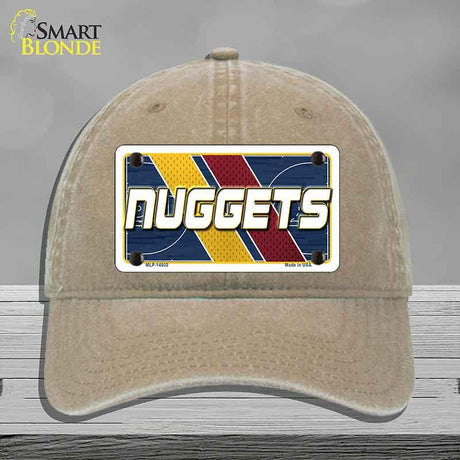 Beige cap with a 'NUGGETS' license plate design on a gray background