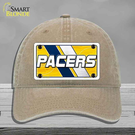 Beige cap with a Pacers logo on a gray background