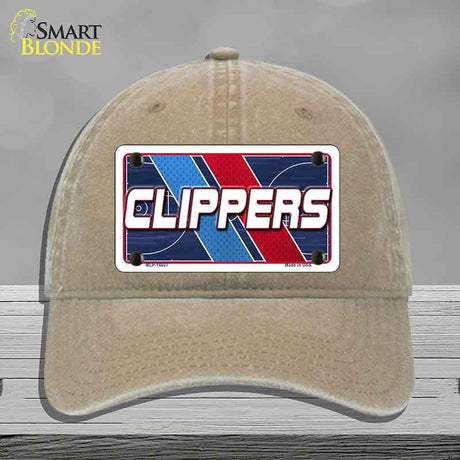 Beige cap with a 'CLIPPERS' logo on a gray background