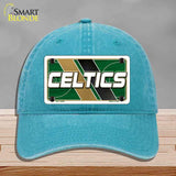 Blue cap with Celtics logo on a gray background
