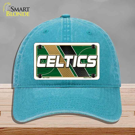 Blue cap with Celtics logo on a gray background