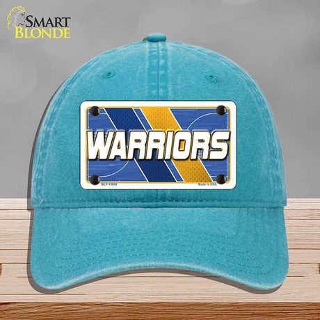 Blue cap with 'Warriors' logo on a gray background