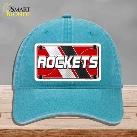 Blue cap with 'ROCKETS' logo on a gray background