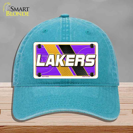 Blue cap with Lakers logo on a gray background