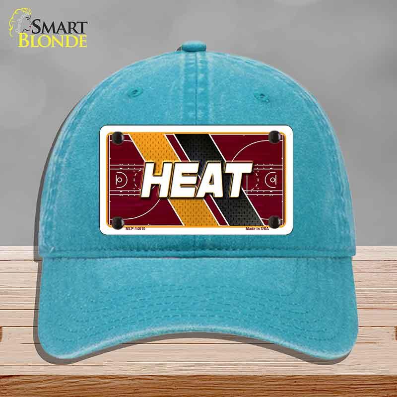 Blue cap with 'HEAT' design on a gray background