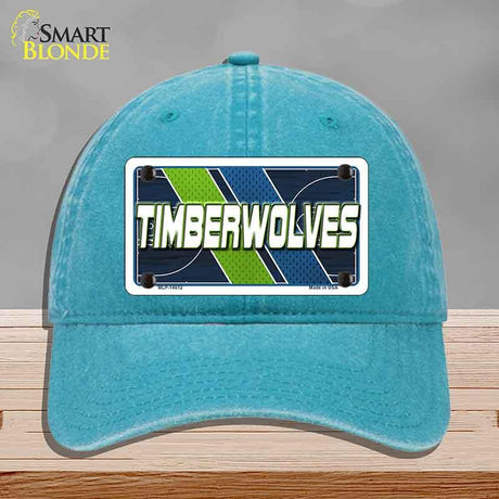 Blue cap with 'TIMBERWOLVES' design on a gray background