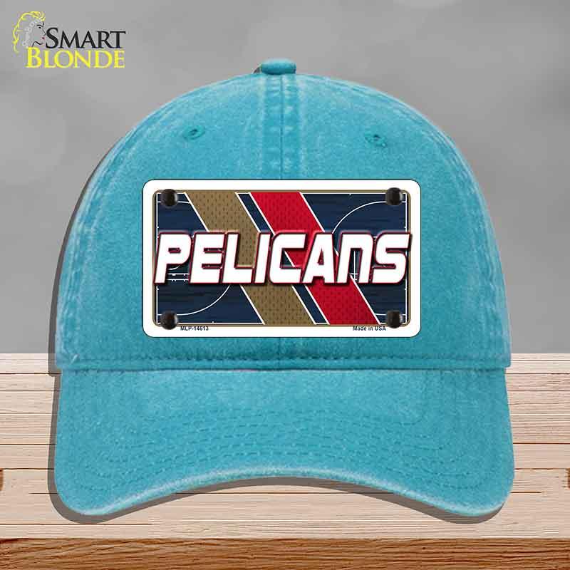 Blue cap with 'Pelicans' logo on a gray background