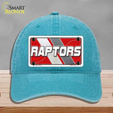 Blue cap with a 'Raptors' license plate design on a gray background