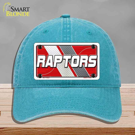 Blue cap with a 'Raptors' license plate design on a gray background