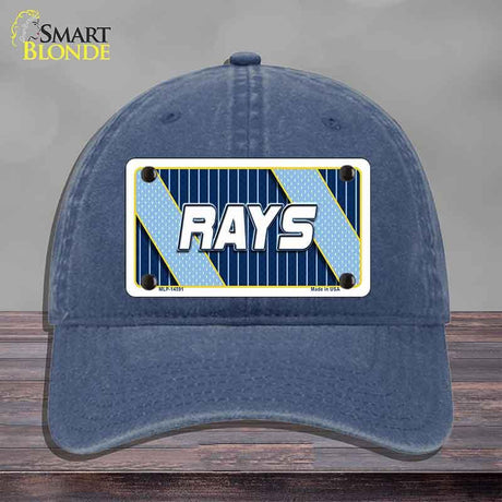 Blue cap with a 'RAYS' license plate design on a wooden surface
