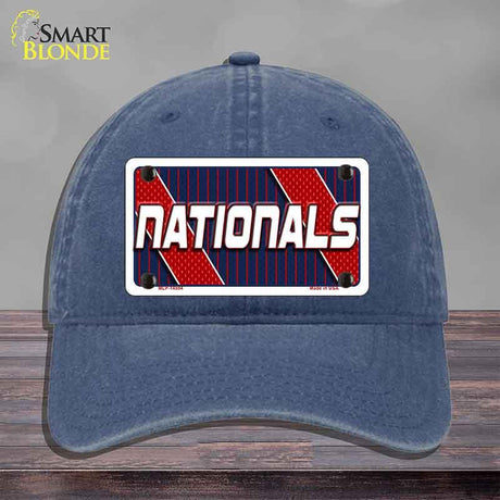 Blue cap with 'Nationals' license plate design on a gray background